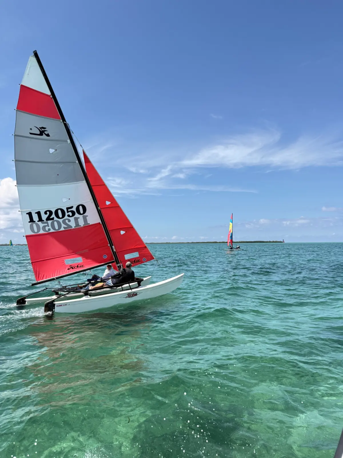 Hobie Cat sailing in clear Cayman waters